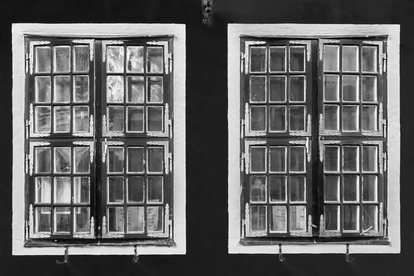 Contrast black and white vintage windows with reflections — Stock Photo, Image