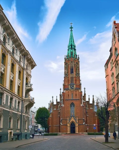 Latvia Riga, Gertrudes church, old town center with a blue sky. Silent town in the early morning light. Travel photo. — Stock Photo, Image