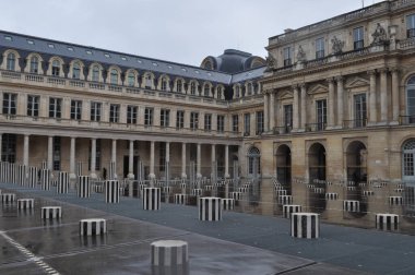 PARIS, FRANCE - CIRCA MARCH 2019: Les Deux Plateaux, aka Colonnes de Buren, art installation by French artist Daniel Buren in the inner courtyard (Cour d'Honneur) of the Palais Royal (Royal Palace) clipart
