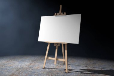 Wooden Artist Easel with White Mock Up Canvas in the volumetric  clipart