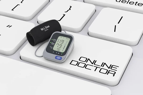 电子血压计与袖口在计算机键盘 — 图库照片