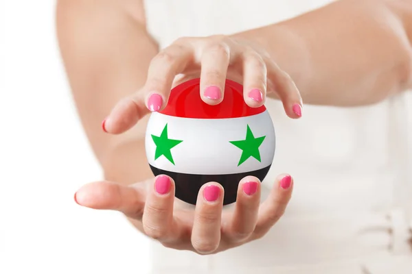 Two Woman Hands Protecting Syria Flag Earth Globe Sphere. — Stock Photo, Image