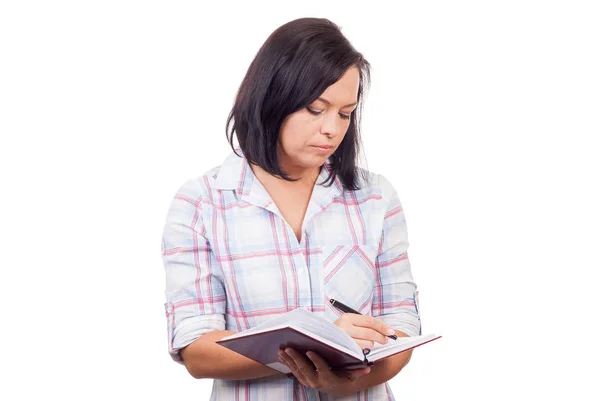 Beautiful Young College Girl with a Pen and a Textbook — Stock Photo, Image