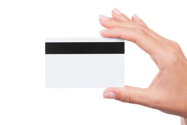 Donna mano che tiene bianco bianco carta di credito in bianco . — Foto Stock
