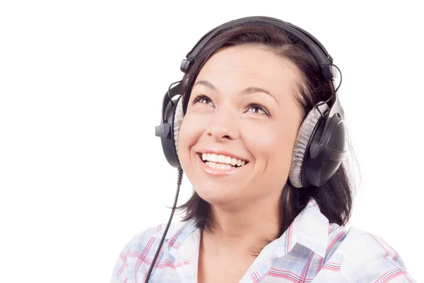 Happy Smiling Beautiful Young Woman Listening Music with Headpho Royalty Free Stock Images