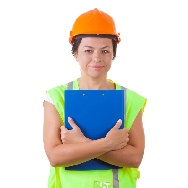 Trabalhador mulher atraente em jaqueta de segurança e capacete amarelo Holdi — Fotografia de Stock