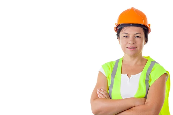 Trabalhador mulher atraente em jaqueta de segurança e capacete amarelo — Fotografia de Stock