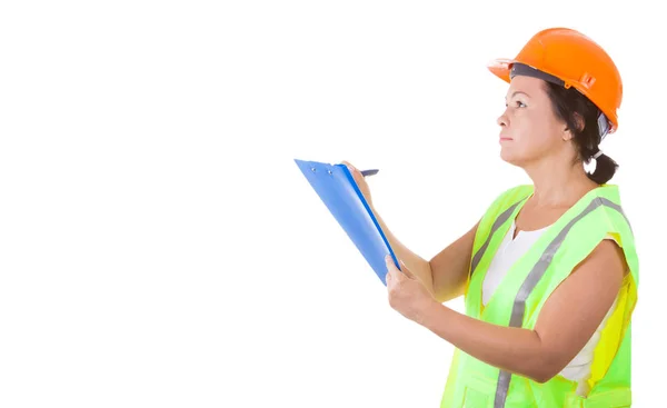 Atractiva mujer trabajadora en chaqueta de seguridad y casco amarillo Holdi — Foto de Stock