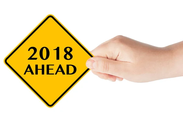 2018 Year Ahead Traffic Sign in Woman's Hand — Stock Photo, Image
