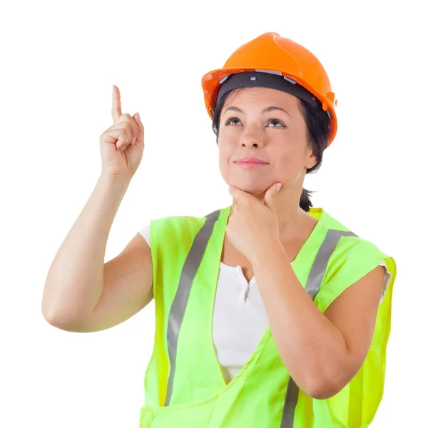 Atraktivní žena pracovníka v bezpečnostní vestu a žlutá helma získat — Stock fotografie