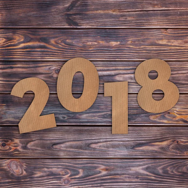 Cardstock Numbers 2018 Happy New Year Sign over table. 3d Render — Stock Photo, Image