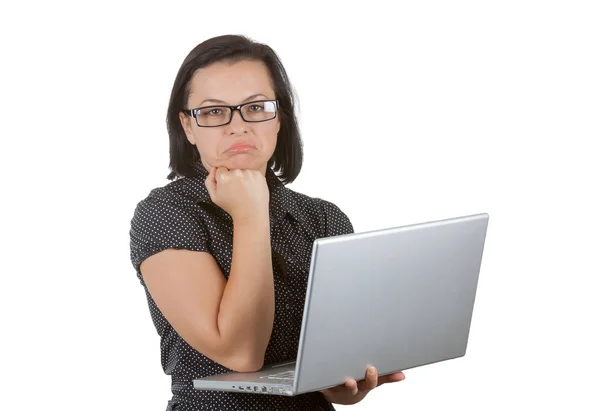 Triste donna d'affari in occhiali che lavora sul computer portatile — Foto Stock