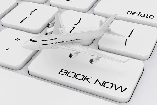 Vit Jet passagerarens flygplan över datorns tangentbord med bok — Stockfoto