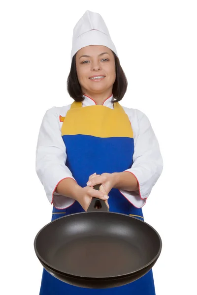 Piękne Młoda kobieta kucharz z patelni w jej ręce — Zdjęcie stockowe