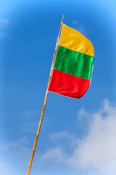 Lithuania Flag Blowing in the Wind on a Blue Sky Background — Stock Photo, Image