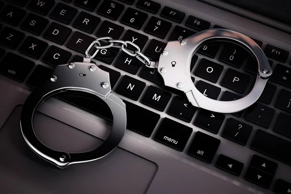 Cyber Crime Concept. Handcuffs on Laptop Computer. 3d Rendering — Stock Photo, Image