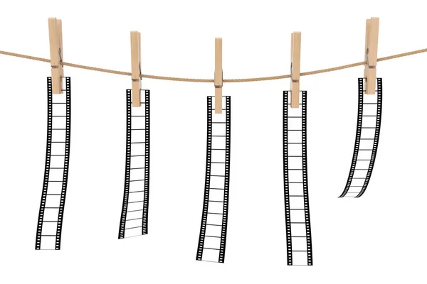 Leeg en leeg Films opknoping op touw door houten wasknijpers. 3D — Stockfoto