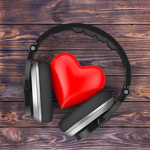 Concepto de música de amor. Auriculares inalámbricos negros y un corazón rojo. 3. —  Fotos de Stock