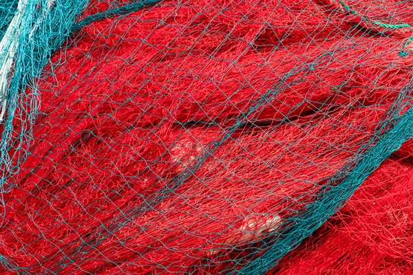 Rede de pesca vermelha Pilha fundo textura — Fotografia de Stock