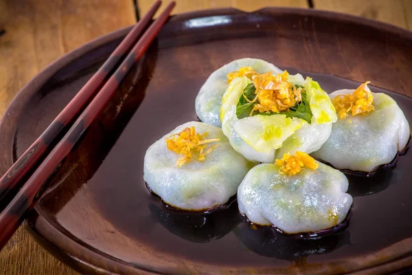 Şeker Kuicheai, soya kaynaklı sarımsak soğanı. Dim sum Çin mutfağıdır..