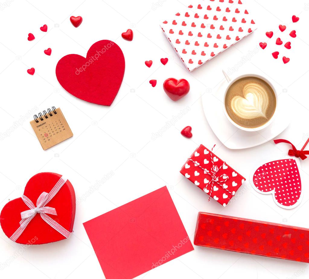 Cup of coffee and heart shaped cookies with gifts on white background. Happy valentine's day. Flat lay