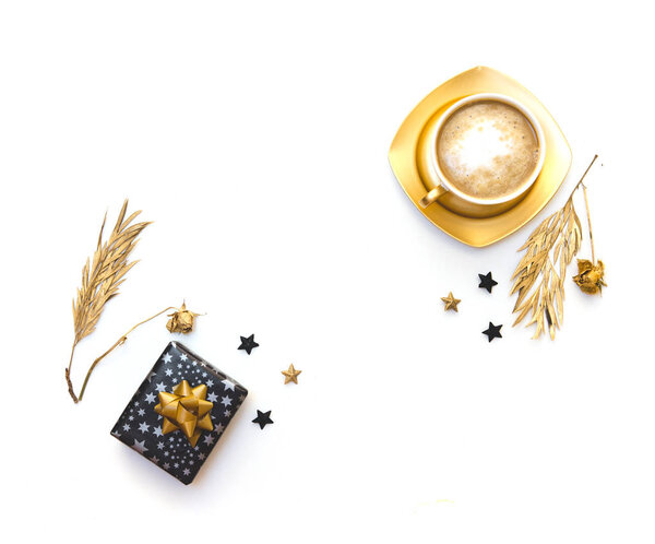 Flat lay with coffee and gift box. White background 