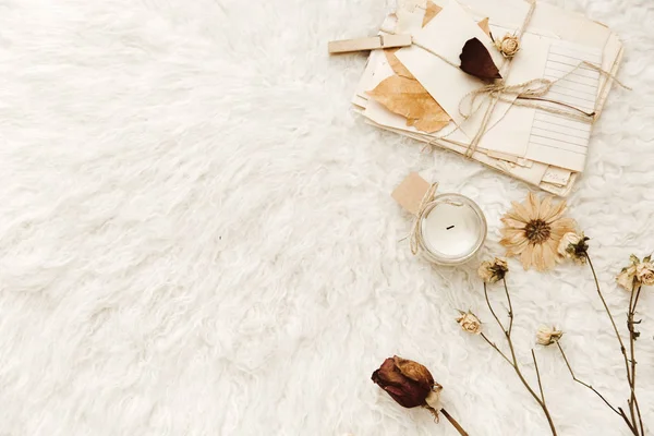 Candles, old letters and dried flowers at white background. Cozy vintage. Flat lay, top view — Stock Image Candles Old Letters Dried Flowers White Background Cozy Vintage Flat Royalty Free Stock Images