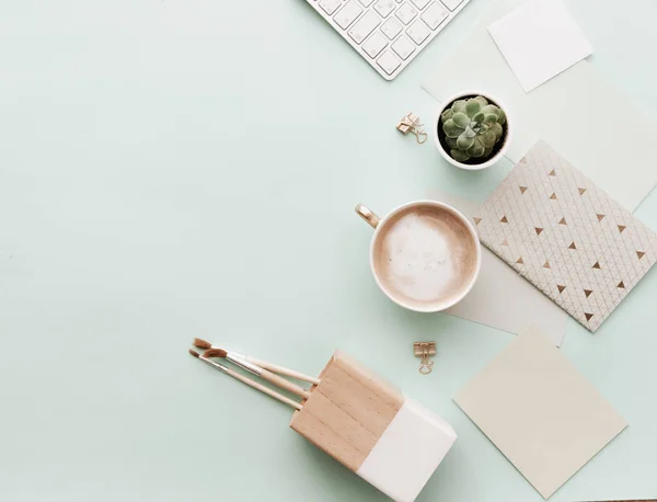 Minimalist Flat Lay Hipster Desktop With Coffee Latte and Supplies