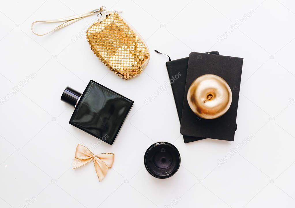 Flat lay, black and gold style office table desk. feminine working supplies. Beauty blogger 