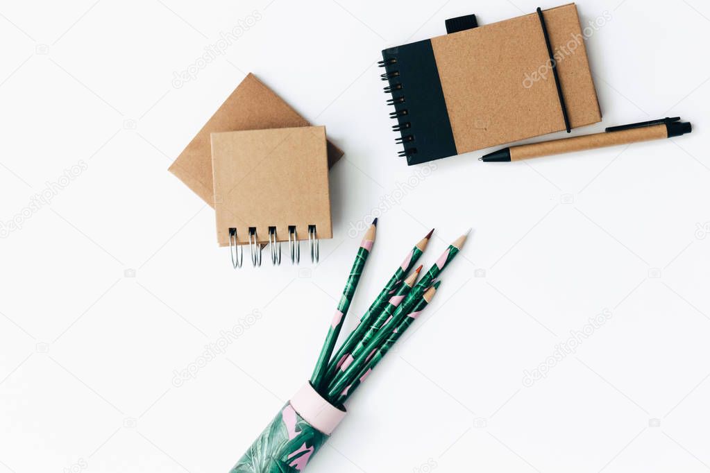 Eco Craft items on white background. Flat Lay stationary and pencils 