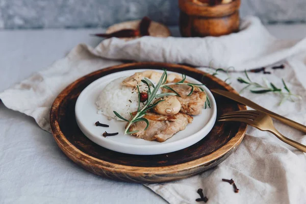 Grilled meat with rice on linen table. Spanish tapas