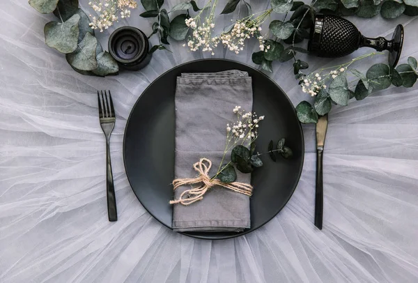 Flat lay meal background. Rustic style. Romantic holiday table setting. Empty plate with decorations. Restaurant concept.