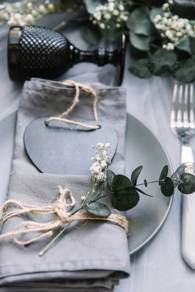 Flat lay meal background. Rustic style. Romantic holiday table setting. Empty plate with decorations. Restaurant concept.