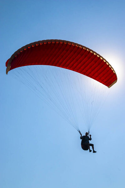 Sun Shining Red Paraglide Unrecognizable Paraglider Silhouette Stock Image