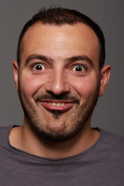 Man doing a funny facial expression — Stockfoto