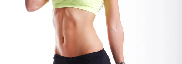 Beautiful young women working out in the fitness studio — Stock Photo, Image