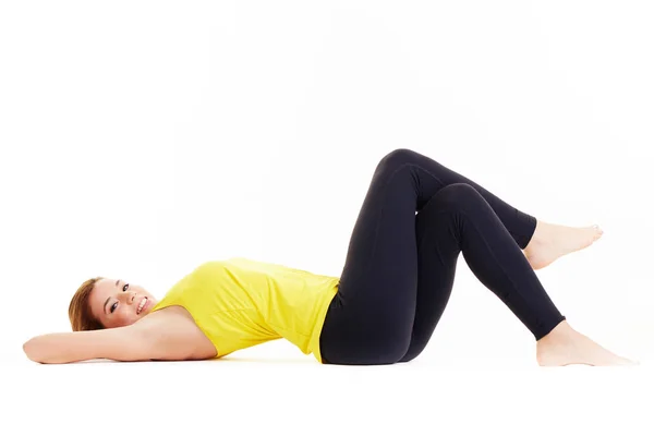 One woman exercising workout fitness aerobic exercise abdominals push ups posture on studio isolated white background — Stock Photo, Image