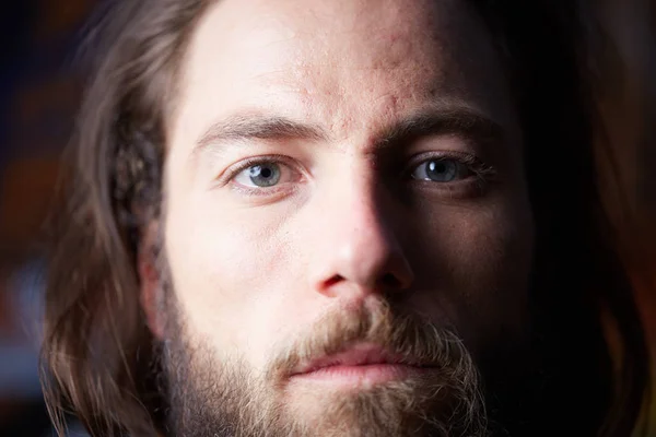 Portrait of young bearded long haired man — Stock Photo, Image
