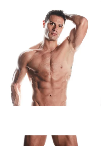 Очень мускулистый красивый сексуальный парень на белом фоне — стоковое фото