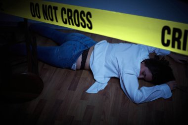 crime scene - woman lying dead on the floor