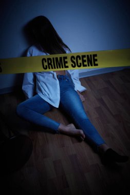 crime scene - woman lying dead on the floor