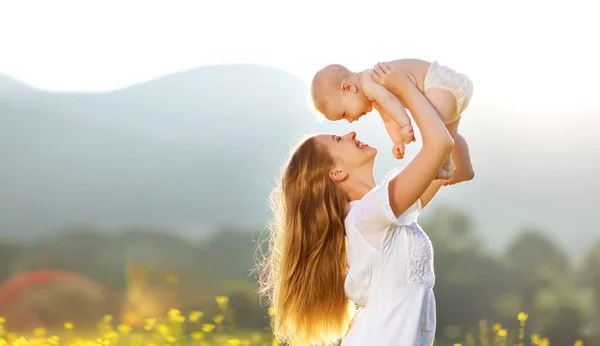 Happy family mother and baby son in  nature in summer — Stock Photo, Image