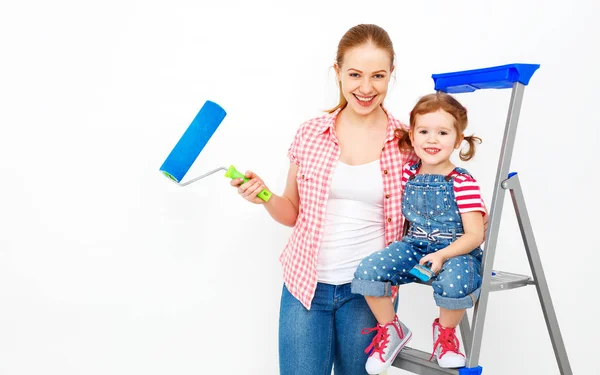 Repair in apartment. Happy family mother and child daughter pain — Stock Photo, Image
