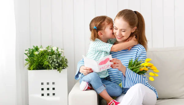 Happy mother's day! Child daughter congratulates moms and gives — Stock Photo, Image