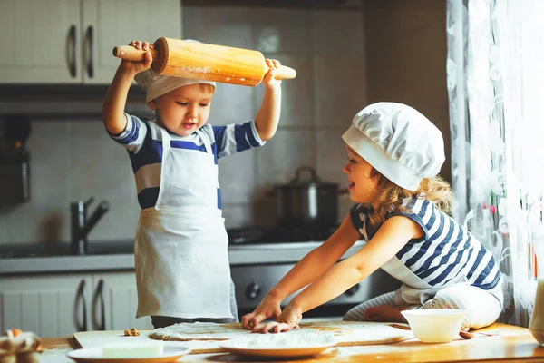Happy family funny kids bake cookies in kitchen — Stock Photo, Image