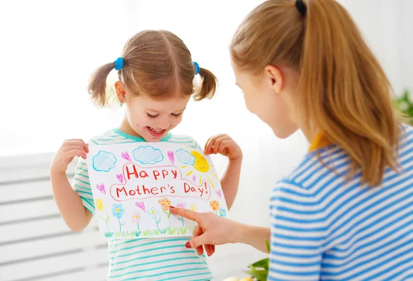 Happy mother's day! Child daughter congratulates moms and gives — Stock Photo, Image