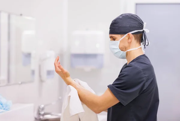 Doctor Surgeon washing hands before operatio