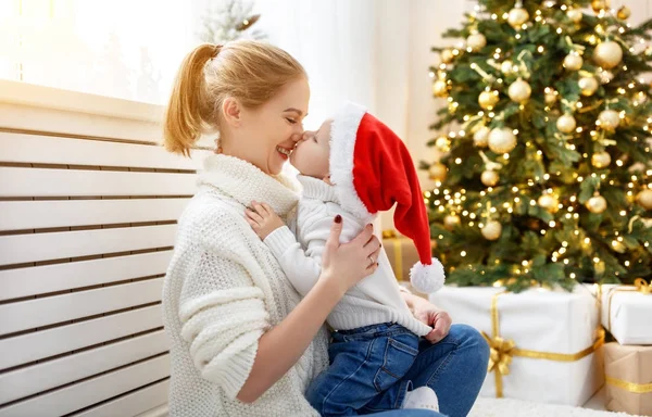 Family mother and baby son at Christmas morning at tree — Stock Photo, Image