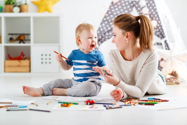 Children creativity. mother and baby son drawing together — Stock Photo, Image