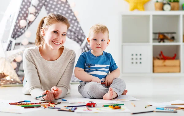 Children creativity. mother and baby son drawing together — Stock Photo, Image